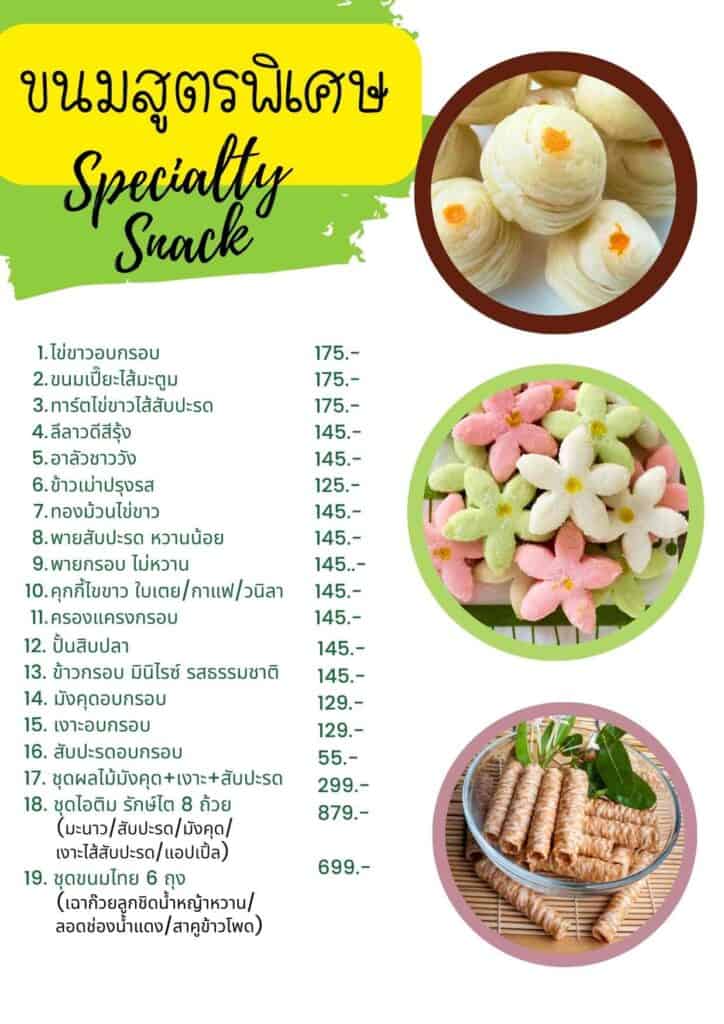 Fresh steamed Chinese herbal buns with colorful flower-shaped varieties.