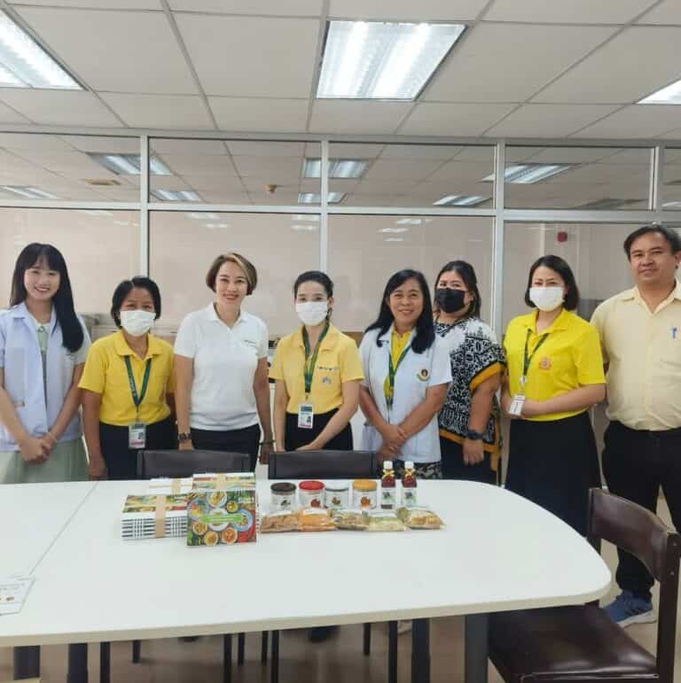 Fresh organic products displayed at Green & Organic event in Thailand.